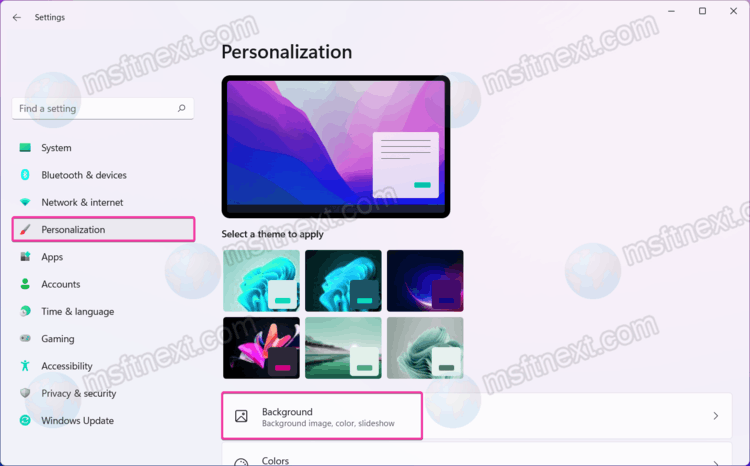 Go to Personalization> Background in Windows 11 Settings
